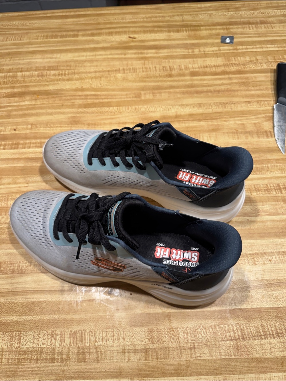 Skechers Men’s Light Gray & Black Athletic Shoes with Subtle Teal Accents